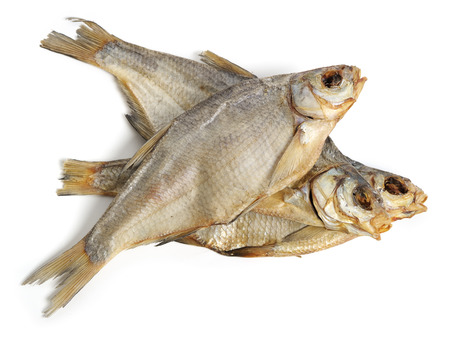 Dry fishes isolated on white backgroundの写真素材