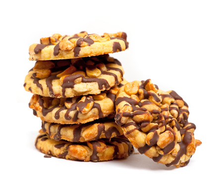 Chocolate chip cookies with peanuts isolated on white backgroundの写真素材