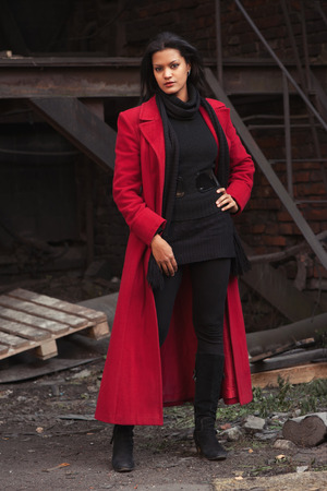 Woman in red coatの写真素材