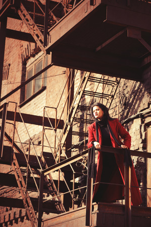 Woman in red coatの写真素材