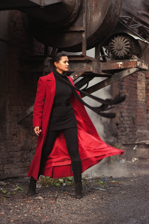 Woman in red coatの写真素材