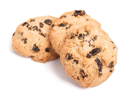 Cookies with raisins isolated on white backgroundの写真素材