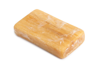 Piece of brown soap isolated on white backgroundの写真素材