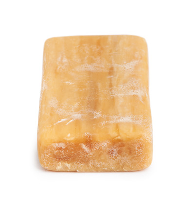 Piece of brown soap isolated on white backgroundの写真素材