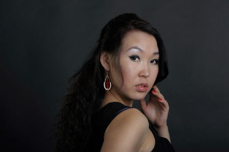 Portrait of woman in black dressの写真素材