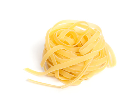 Pasta nest isolated on white backgroundの写真素材