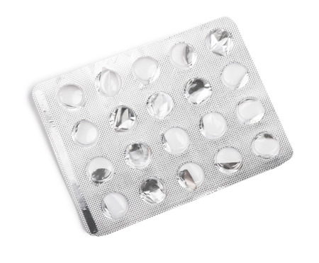 Empty pack of pills isolated on white background