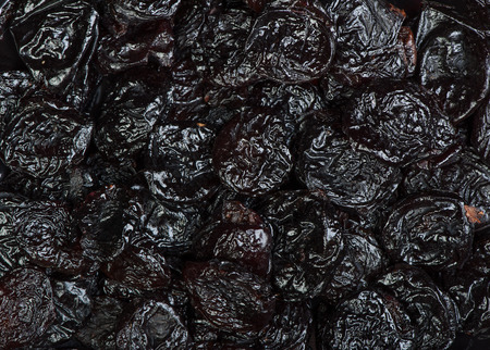 Top view of prunes as background textureの写真素材