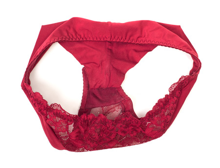 Red lace panties isolated on white backgroundの写真素材