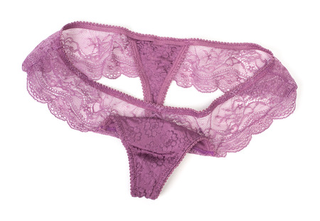 Purple lace panties isolated on white backgroundの写真素材