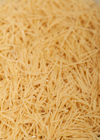 Raw vermicelli pasta texture backgroundの写真素材