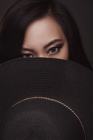 Beauty portrait of asian woman on dark backgroundの写真素材