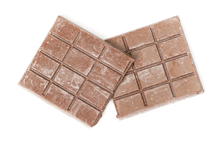 Close up of segment chocolate bar isolated on white backgroundの写真素材