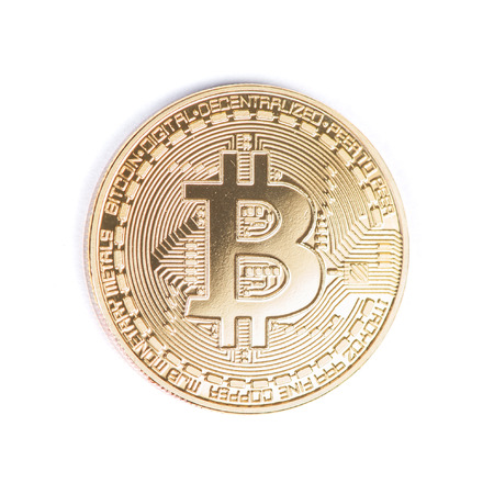 Golden bitcoin isolated on a white backgroundの写真素材
