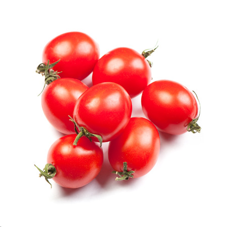 Group of fresh cherry tomatoes isolated on white backgroundの写真素材