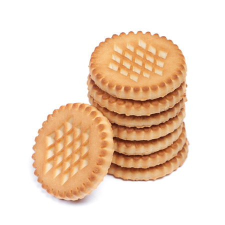 Heap of round cookies isolated on white backgroundの写真素材