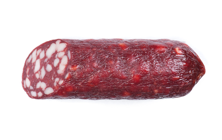 Cut part of smoked salami sausage isolated on whiteの写真素材