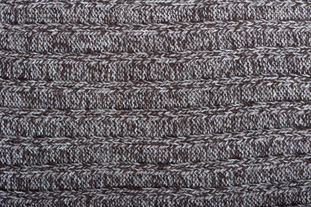 Texture of winter knit clothes, large knitting, background