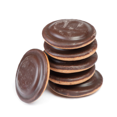 Group of round delicious glazed chocolate chip cookies with jam inside isolated on white backgroundの写真素材