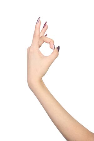 Female with manicure hand gesture isolated on white backgroundの写真素材