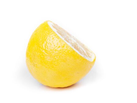Half of yellow ripe lemon citrus fruit isolated on white backgroundの写真素材