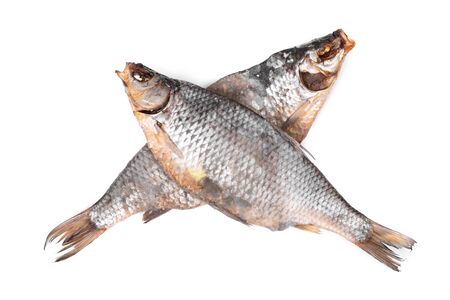 Rotten dried fish isolated on white background