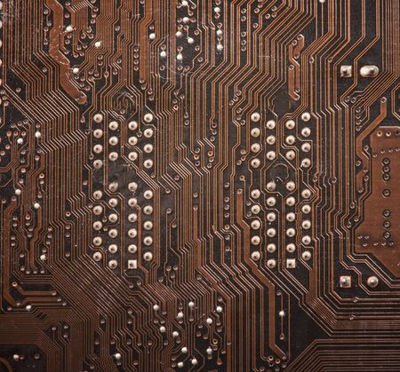 Modern printed brown circuit board, electronic circuit board, textolite. Background banner.の写真素材