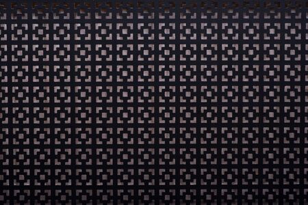 Black panel pad for radiator, wooden texture of screen