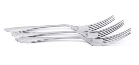 Three stainless steel forks isolated on white background