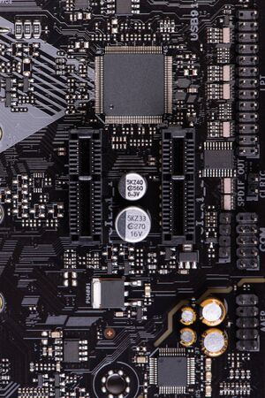 Computer mother board close-up. Circuit board backgroundの写真素材