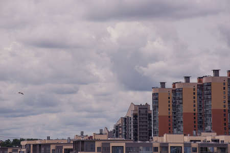Russian modern multi-storey high residential buildings with cloudy skyの写真素材