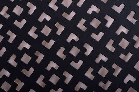 Black panel pad for radiator, wooden texture of screen
