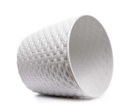 White wicker plastic vase, empty pot isolatedの写真素材