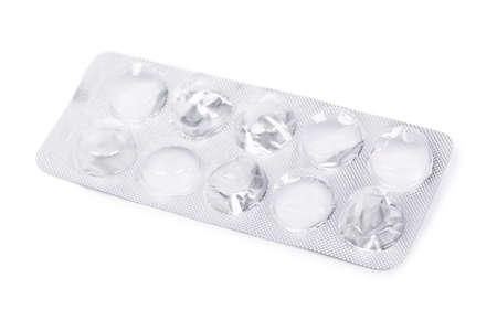 Used pack of pills isolated over white background