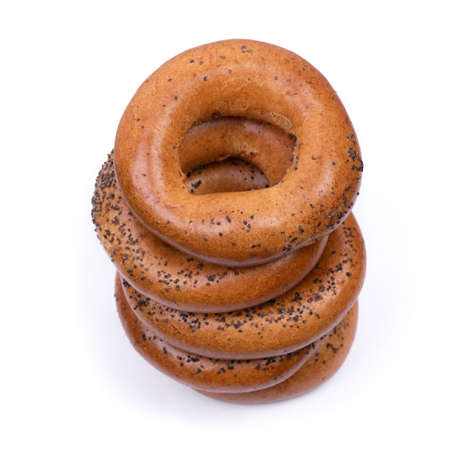 Group of bagels with poppy seeds isolated on white backgroundの写真素材