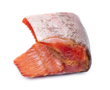Smoked piece of salmon, red fish isolated on white backgroundの写真素材