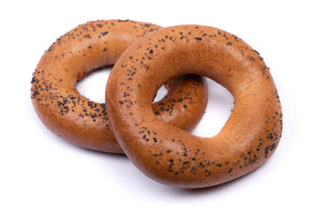 Group of bagels with poppy seeds isolated on white backgroundの写真素材