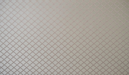 Close-up of textured fabric with rhombus patternの写真素材