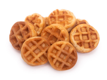 Group of small round tasty waffles isolated on white backgroundの写真素材