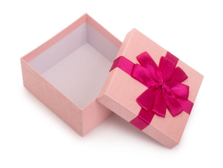 Beautiful opened pink gift box with ribbon isolated over white backgroundの写真素材