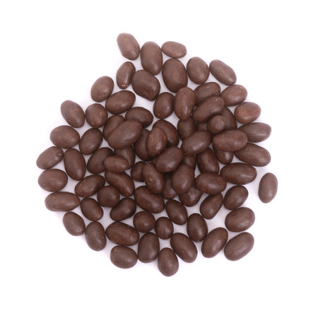 Peanuts covered in chocolate isolated on whiteの写真素材