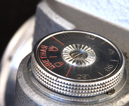 Close-up of a vintage camera's dial. Selective focus.