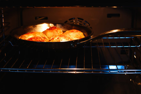 Cooking buns in the oven. Selective focus. Food.