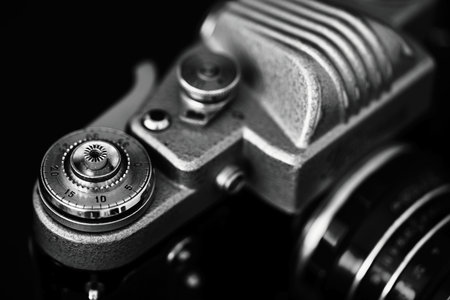 Vintage camera on black background. Close-up. Selective focus.の写真素材