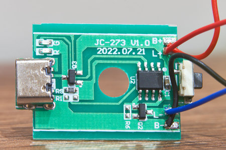 Electronic circuit board with microcircuits, close-up.