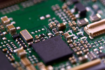 Close-up of electronic circuit board with microchips and microchips