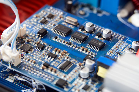 Electronic circuit board with electronic components closeup. Technology background.