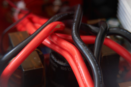 Close-up of an electronic circuit with wires and connectors in a boxの写真素材