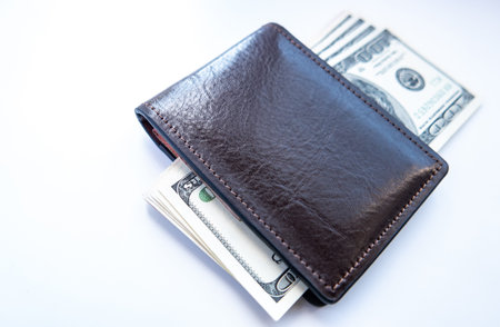 wallet with money isolated on a white background. purse with dollar bills