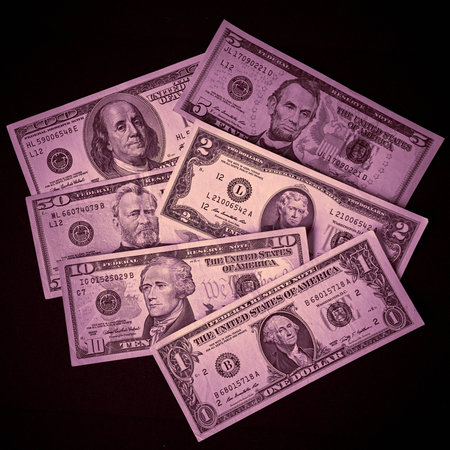 Background of money American hundred dollar bills. Sepia toned.の写真素材